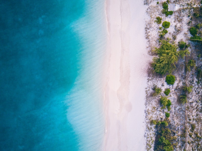 Grace Bay beach from the air, with turquoise water and white sand