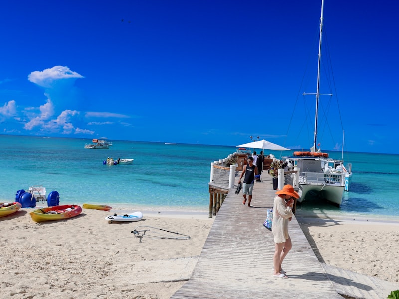 A pier with a catamaran and kayaks in Turks and Caicos