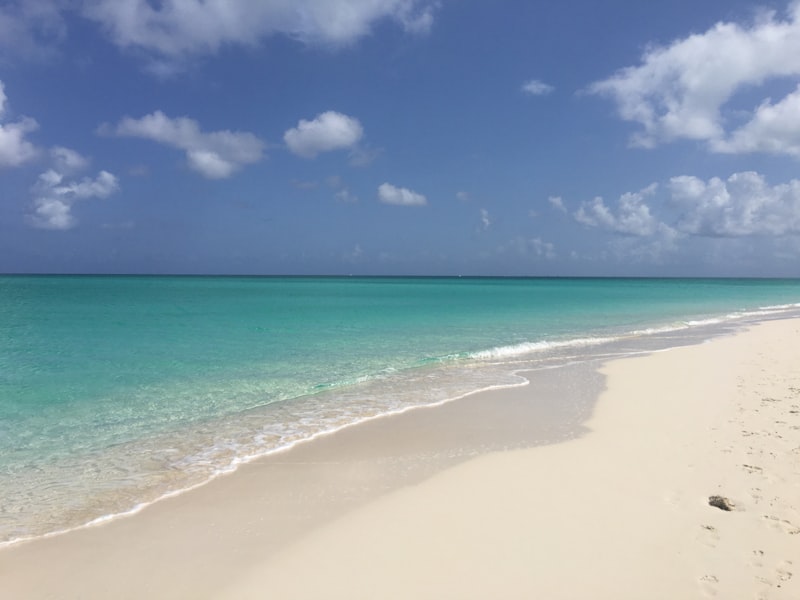 White sand and turquoise water at Long Bay beach